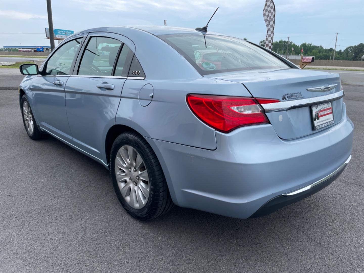 2014 Blue Chrysler 200 (1C3CCBAB0EN) with an 4-Cyl, 2.4 Liter engine, Automatic, 4-Spd transmission, located at 8008 Warden Rd, Sherwood, AR, 72120, (501) 801-6100, 34.830078, -92.186684 - Photo#5